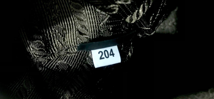 prada-factory-tag